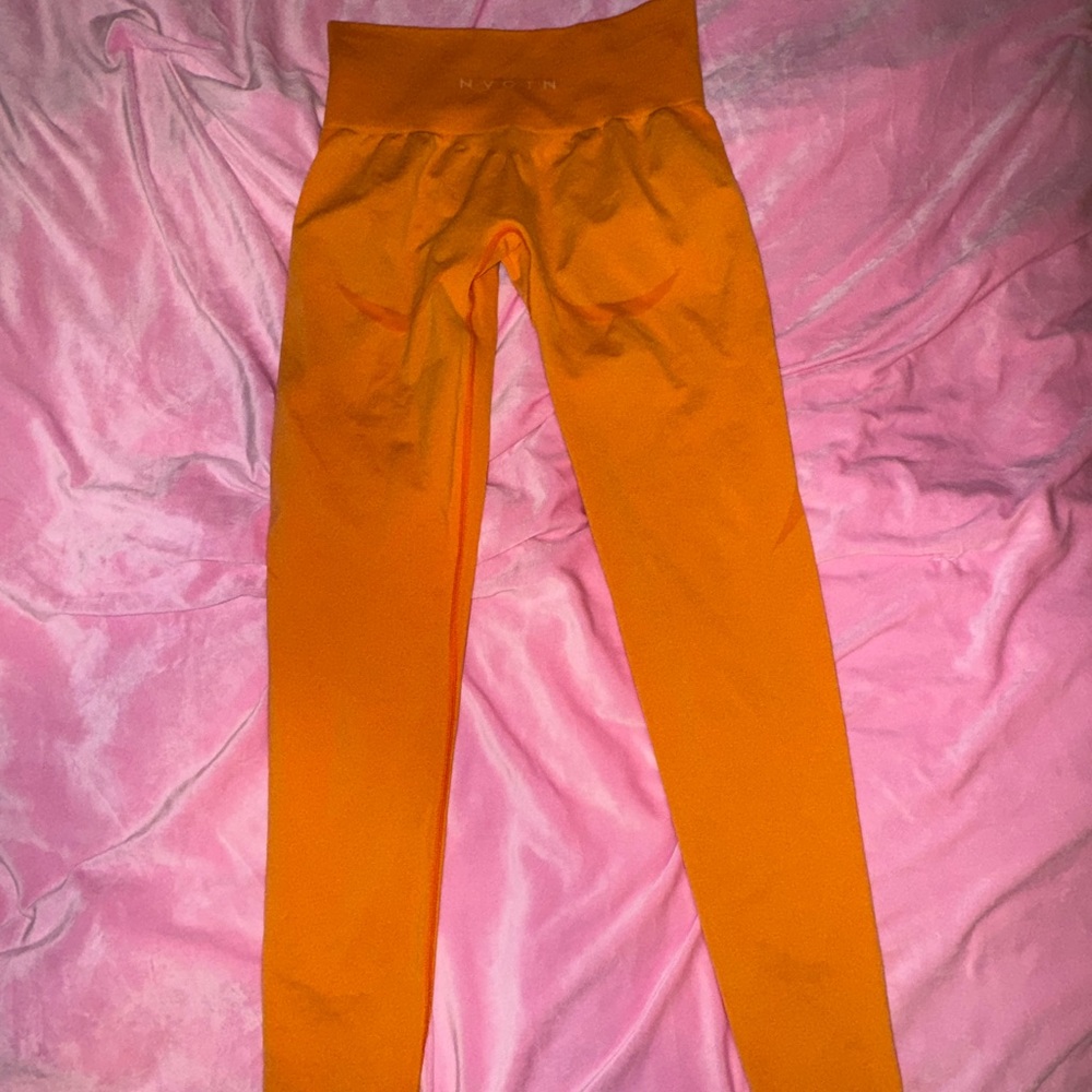 NVGTN seamless sunset Orange contour Leggings
